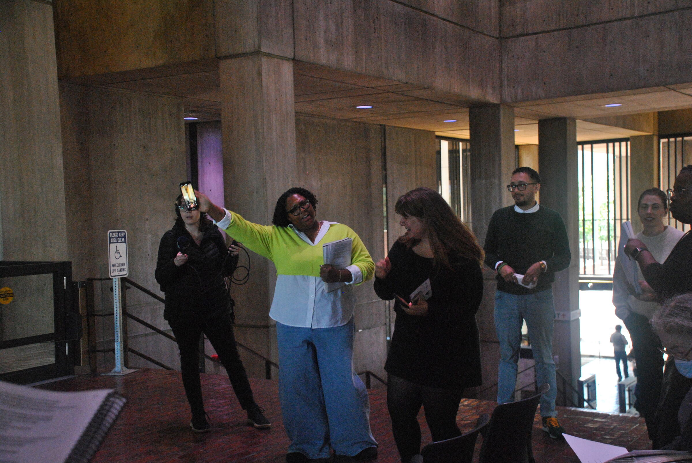 City of Boston staff celebrating and singing together at the reception.