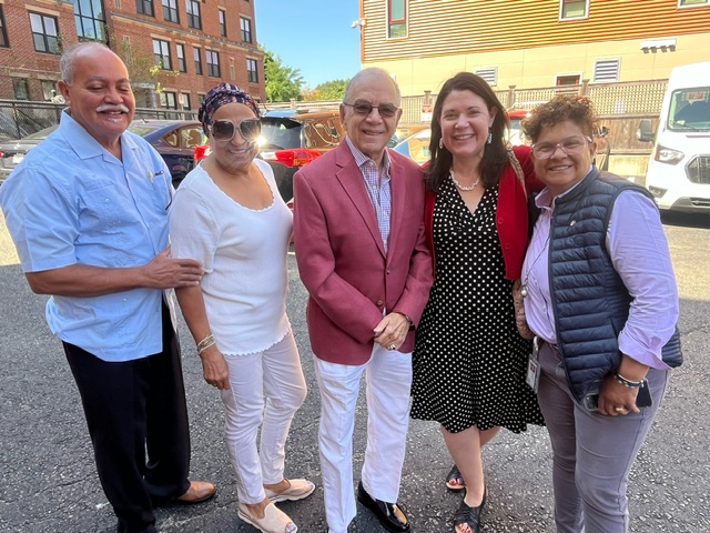 Commissioner Emily Shea with attendees of Nuevo Dia luncheon.