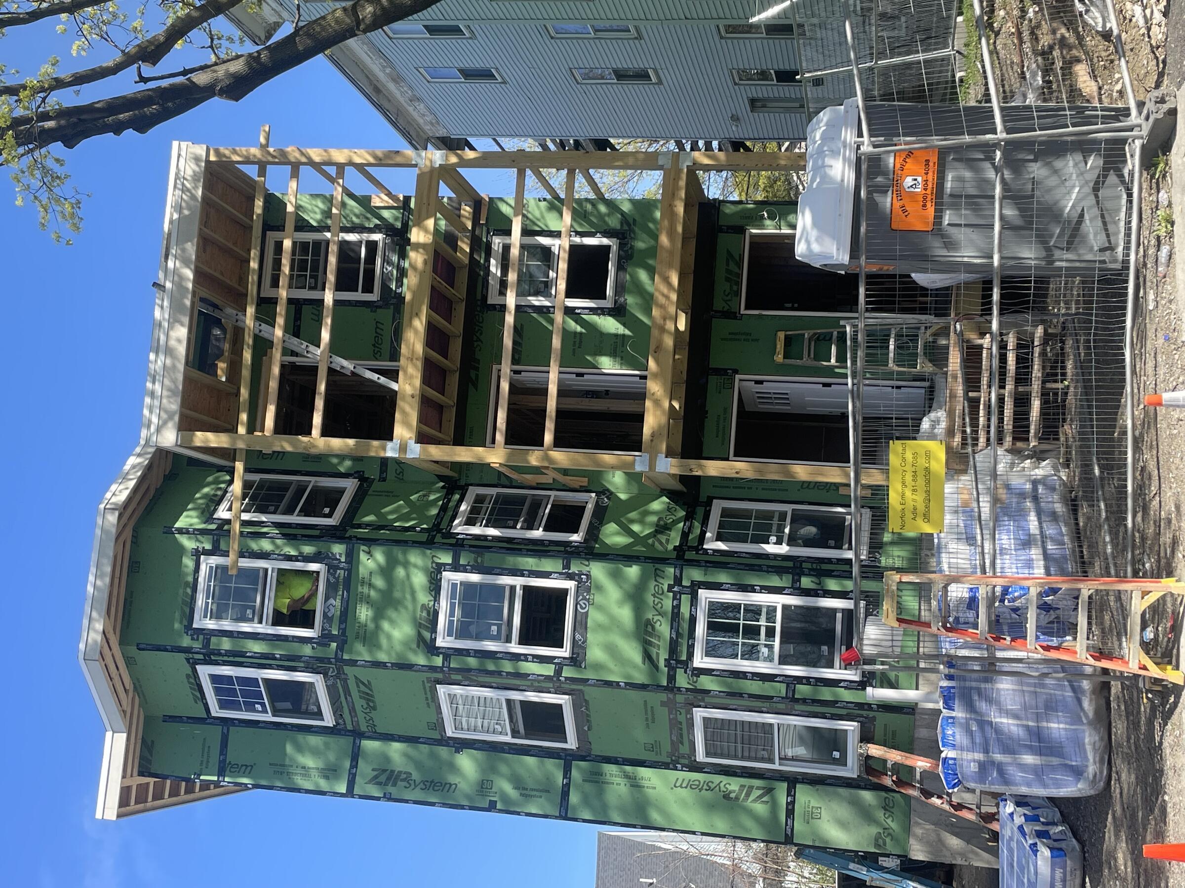 This newly constructed two-family home on Norwell Street in Dorchester has been built in the style of a triple decker home, but has rooms on two floors for the two owners. There are three bedrooms and 1.5 bathrooms for each home, which will be offered at $375,000 to households earning at or below 100% of Area Median Income. 