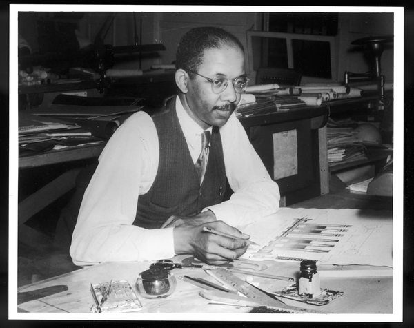 Crite at his desk in 1952 working as an Engineering Draftsman and Technical Illustrator at the Boston Naval Shipyard