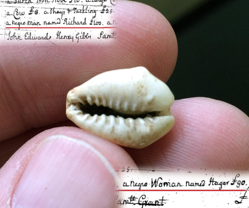 fingers holding a cowrie shell with text overlay describing enslaved people in Boston 