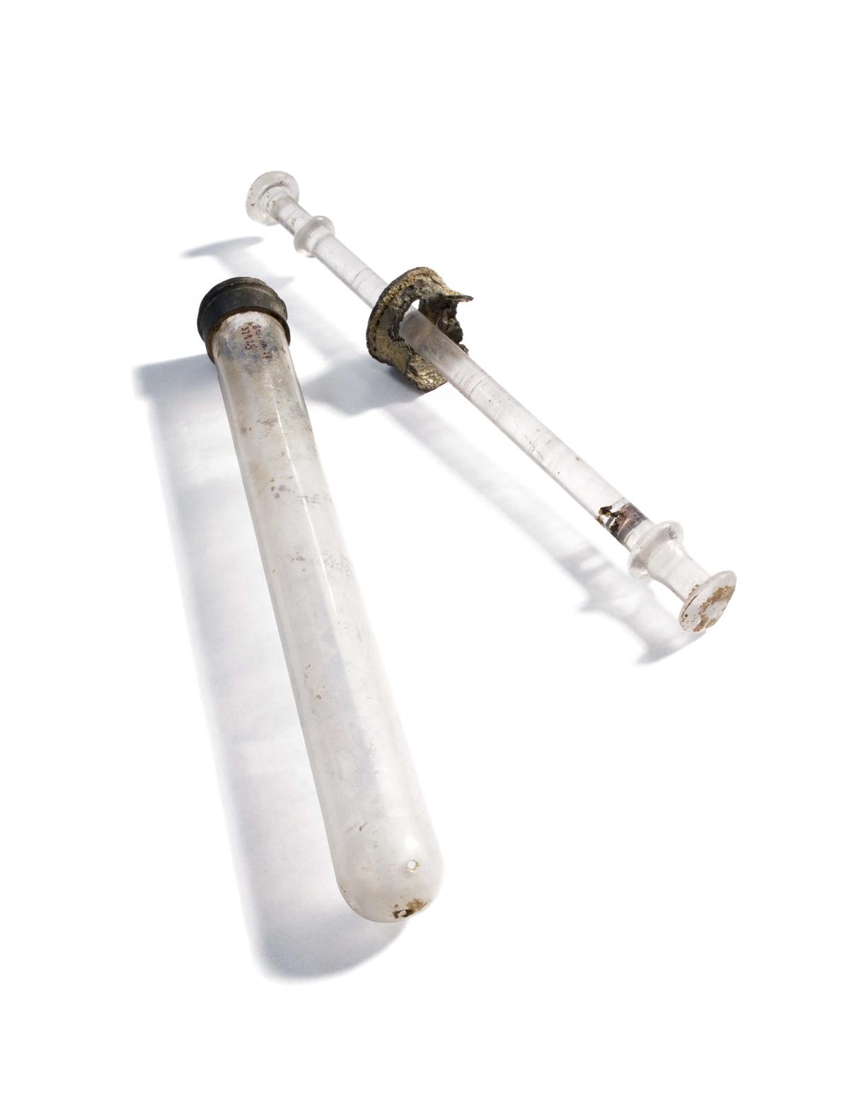 A clear glass vaginal syringe from the 1860s