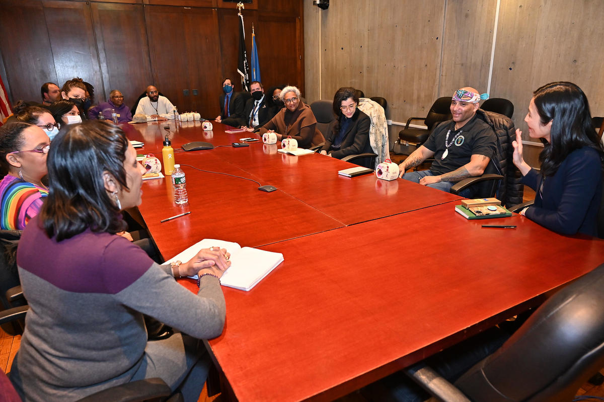 Mayor with Massachusett Tribe at table