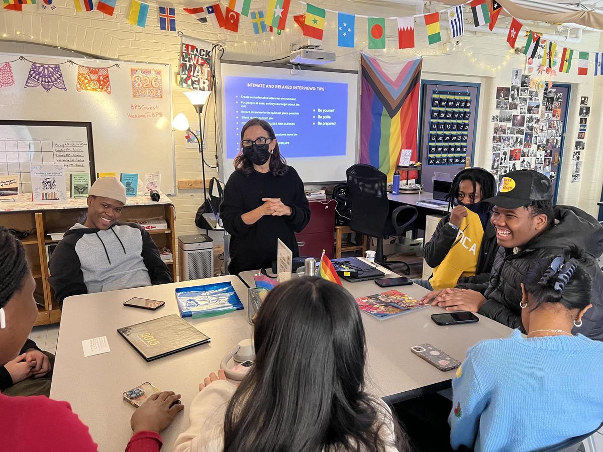 Heloiza Barbosa conducting a storytelling workshop at Boston International Newcomer's Academy in partnership with 826 Boston.