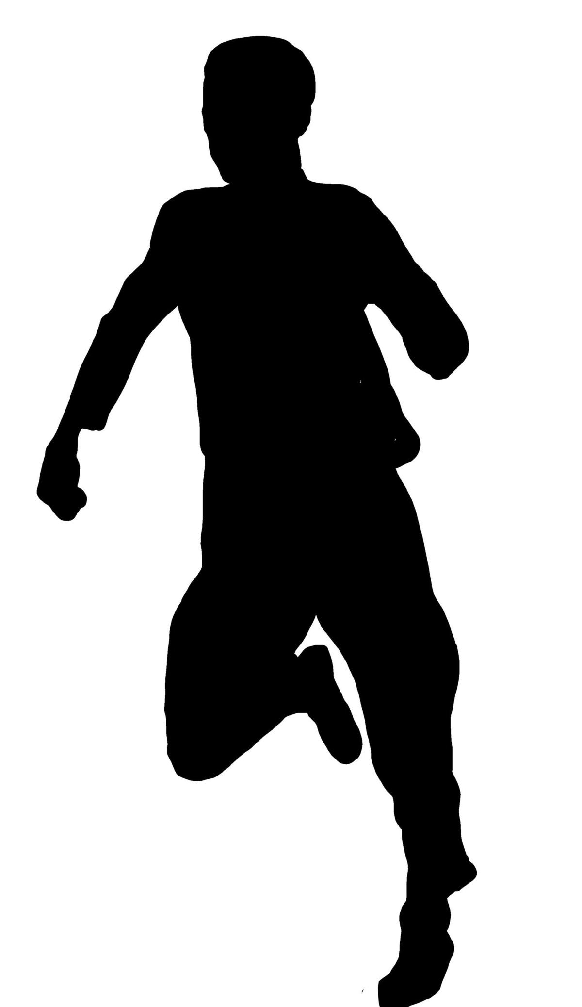 Silhouette of a young man running