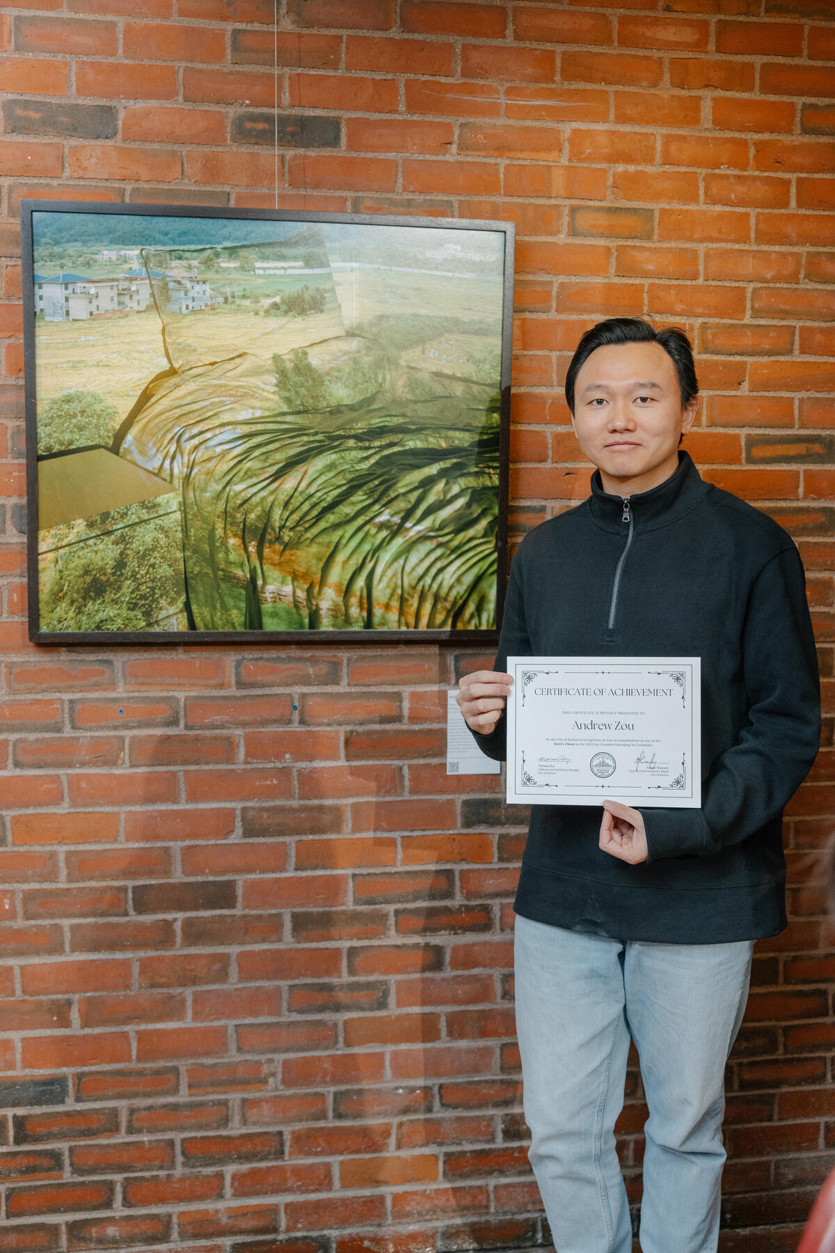 Andrew Zou standing with his winning artwork, Home Home of Andrew from China, Archival Inkjet Print, 2024