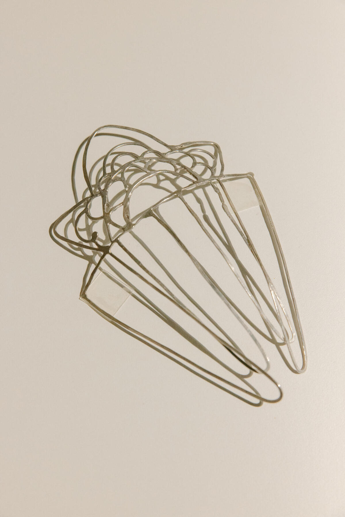 Marisa McCarthy, Peineta, 2023, Fine silver, 7 x 4 x 0.5 in.